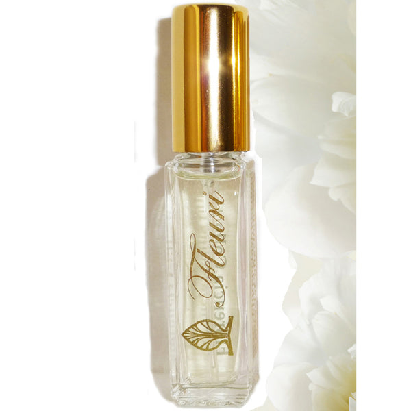 Fleuri Perfume bottle with a gold top.