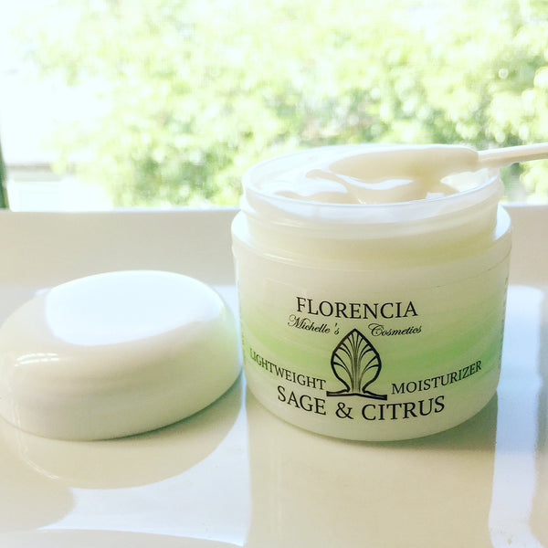 An opened Lightweight Sage & Citrus Moisturizer jar.
